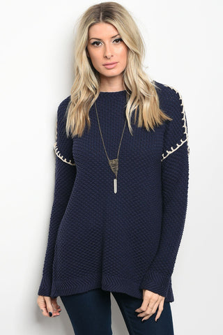 Ladies fashion long sleeve cream chunky knit sweater top that features a open back and rounded neckline