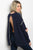 Ladies fashion long sleeve cream chunky knit sweater top that features a open back and rounded neckline
