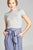 Ladies fashion short sleeve mock neck ruffle hem rayon spandex rib top