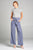 Ladies fashion short sleeve mock neck ruffle hem rayon spandex rib top