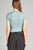 Ladies fashion short sleeve mock neck ruffle hem rayon spandex rib top