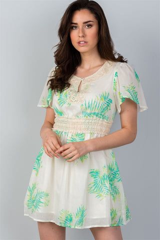 Ladies fashion crochet trim detail neckline button leaf print back cut-out mini dress - merchandiserus2