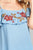 Ladies fashion plus size open shoulder flounce w/embo crepe woven top