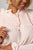 Ladies fashion plus size  long sleeve with elastic cuffs, elastic high neckline & elastic chest detail, sheer, triangle metallic detail allover, high-low hem, relaxed fit, button up & self tie closure detail top