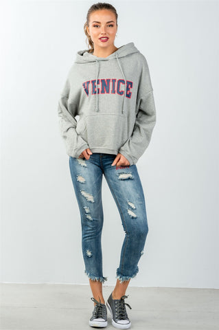 Ladies fashion denim distressed & graphic frayed hem skinny jeans