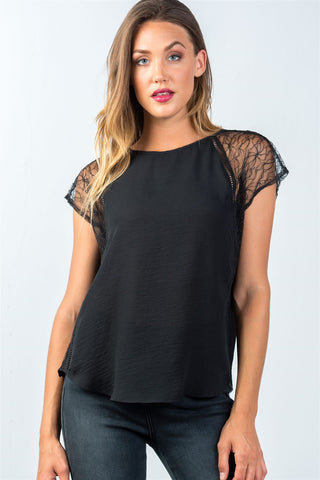 Ladies fashion semi-sheer black lace and ladder-stitch trim top