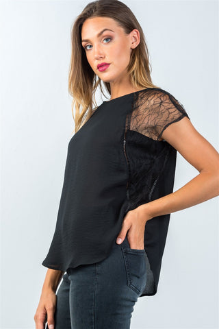 Ladies fashion semi-sheer black lace and ladder-stitch trim top