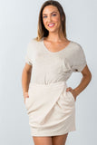 Ladies fashion beige button closure front skirt with side pockets