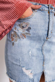 Denim floral embroidered distressed mini skirt