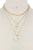 Cross charm layered metal necklace