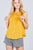 Sleeveless Ruffle Neck W/self Tie Smocked Yoke Detail Front Button Woven Top