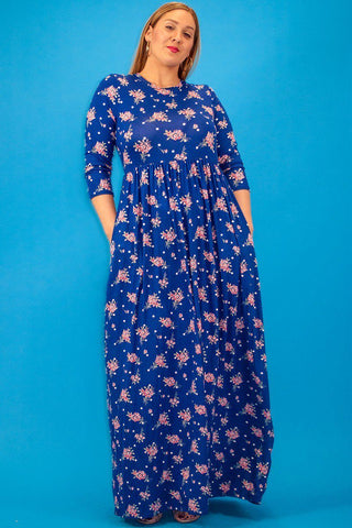 Striped Floral Print Maxi Dress In A Relaxed Fit And Flare Style With A Wrapped V-neck, Short Sleeves, Side Pockets And Waist Tie Belt
