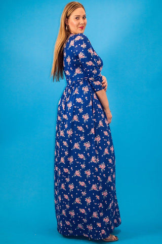 Striped Floral Print Maxi Dress In A Relaxed Fit And Flare Style With A Wrapped V-neck, Short Sleeves, Side Pockets And Waist Tie Belt
