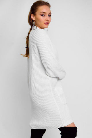 Solid, Think Knit, Button Down Cardigan With Long Sleeves And Front Pockets In A Oversize Loose Fit