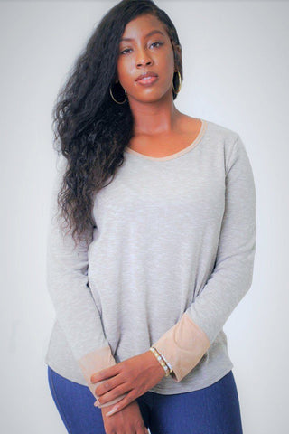 Solid, Waist Length Long Sleeve Top In A Relaxed Style With A Round Neck And Faux Suede Contrast Wrist Cuff.